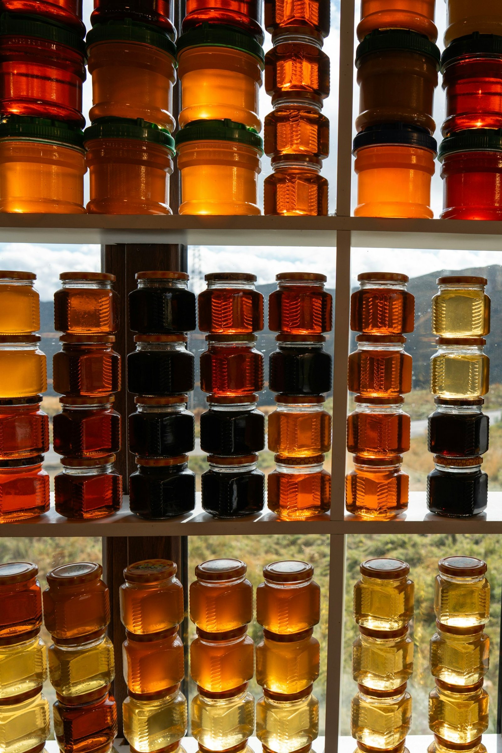 Jars of honey on shelves